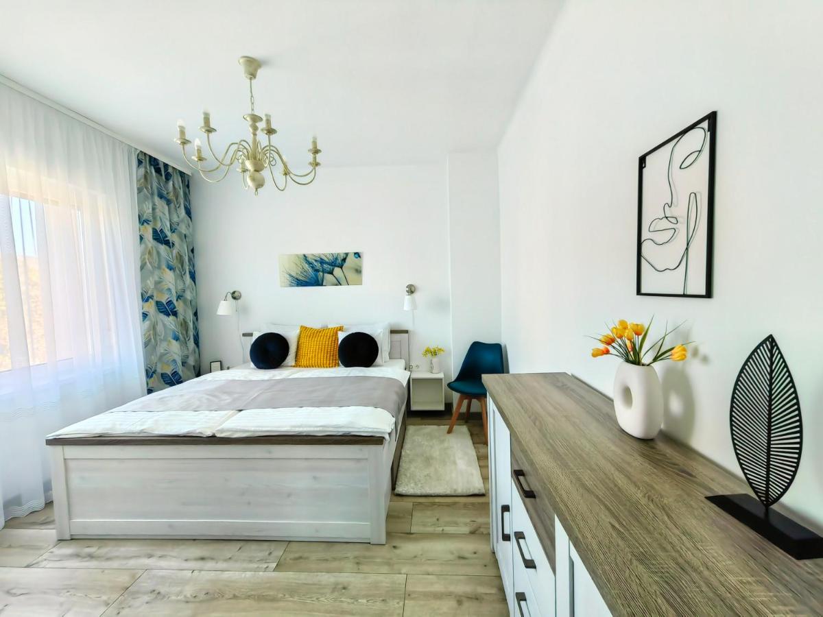 One-Bedroom Apartment with Balcony and City View