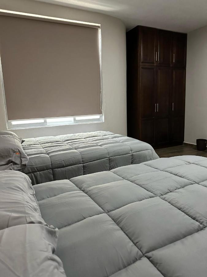 Deluxe Doppelzimmer mit 2 Doppelbetten