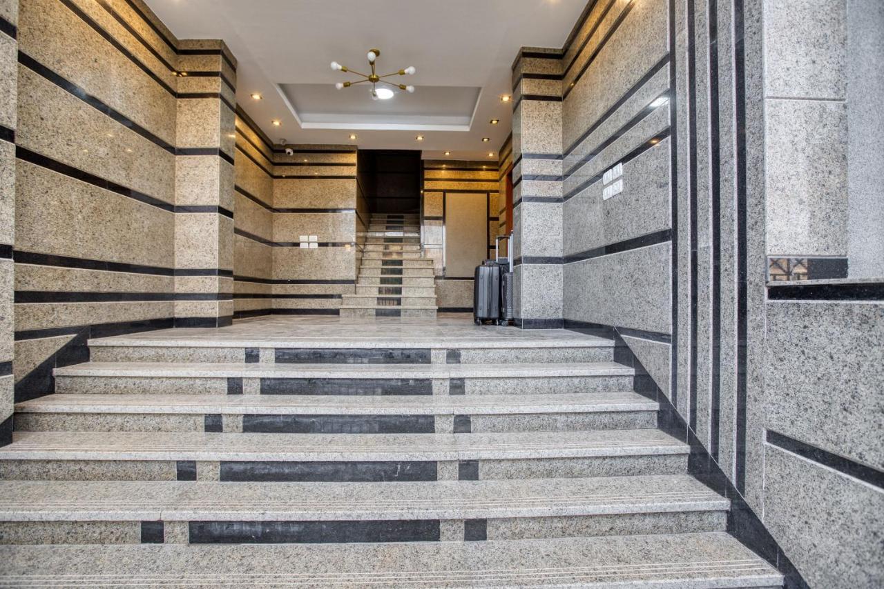 Travelholic AUC Residence - Bed and Breakfast Caïro
