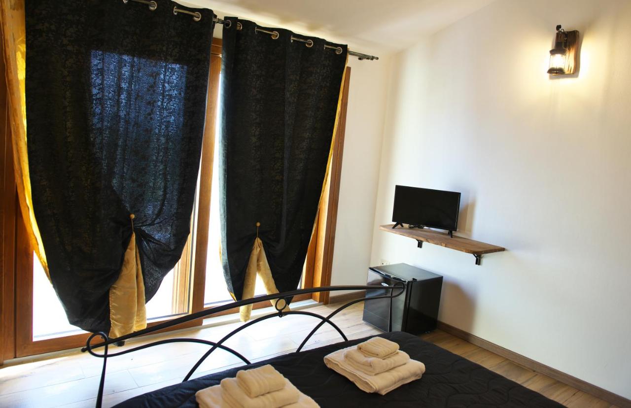 Kamer met Queensize Bed en Balkon