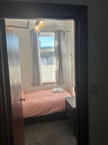 Eenpersoonskamer met Gedeelde Badkamer en Toilet 