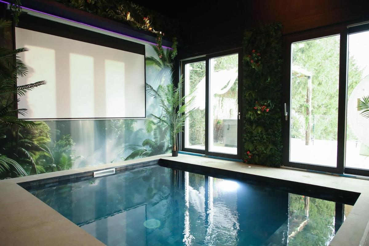 Détente à deux piscine et spa - Ferienwohnung