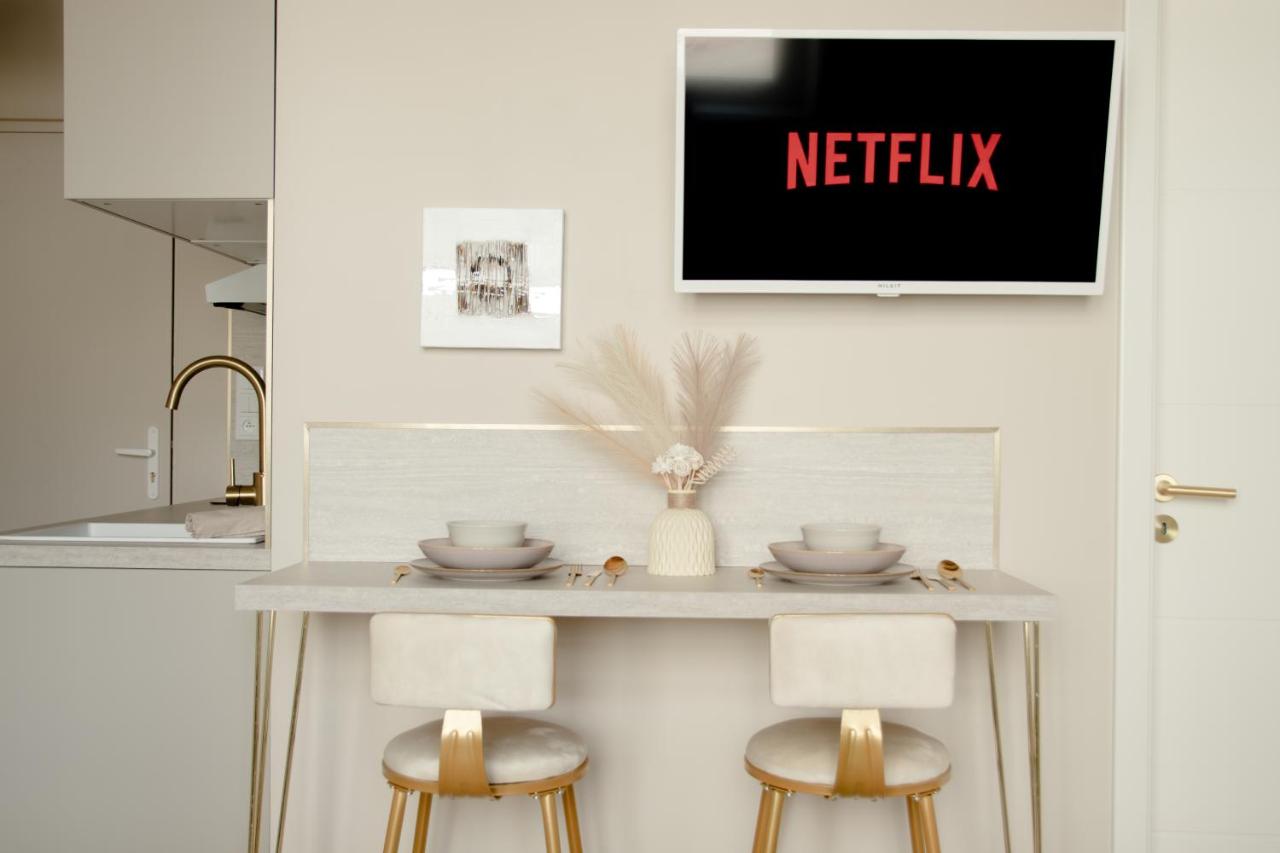 Studio meublé L'écrin doré avec Netflix - B&B
