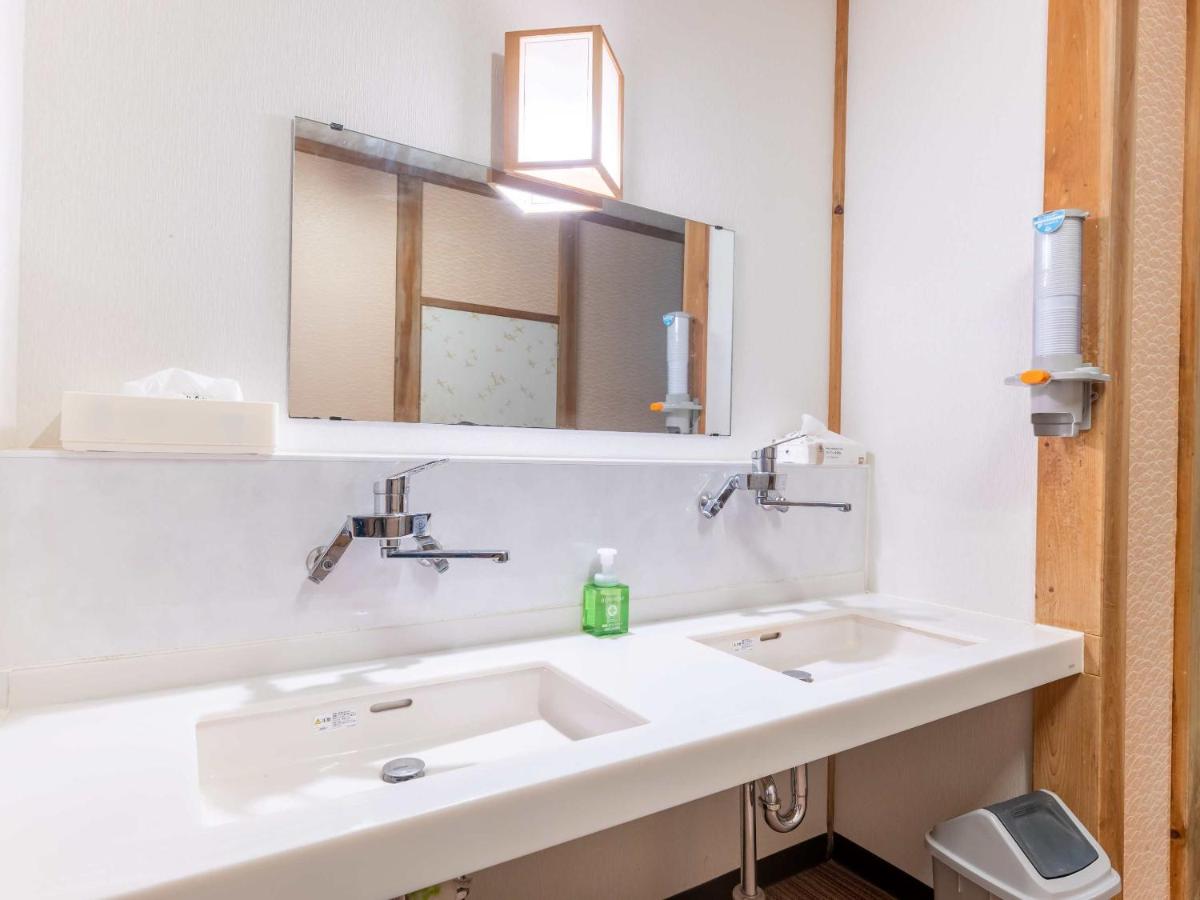 Camera Quadrupla con Bagno in Comune