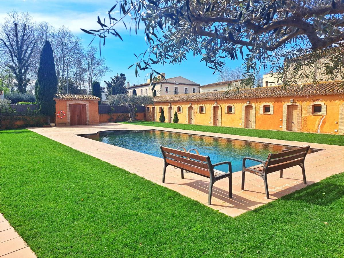 Masía Rústica con Piscina en Torroella de Fluvià - B&B