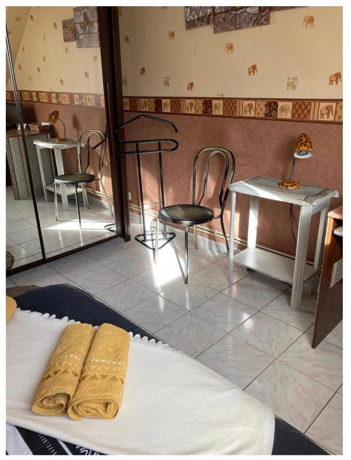 Chambre chez l habitant proche gare - Bed and Breakfast
