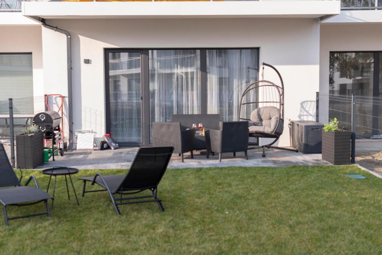Apartament Ustka Holiday z sauną i ogrodem - Ferienwohnung Stolpmünde