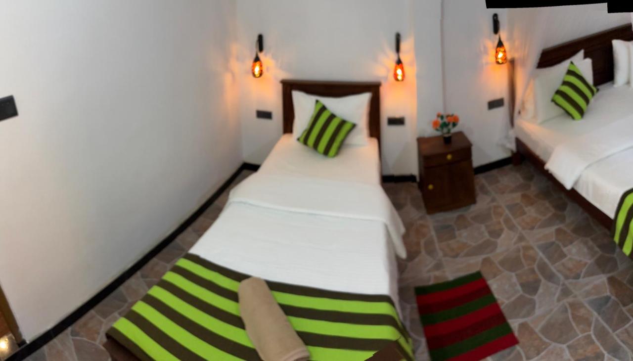 Dreibettzimmer mit Bergblick