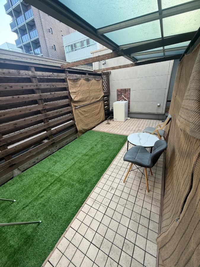 A Europeanstyle building with ng 3 bedrooms that can accommodate 7 people a terrace featuri - Chambres d'hôtes Tokyo