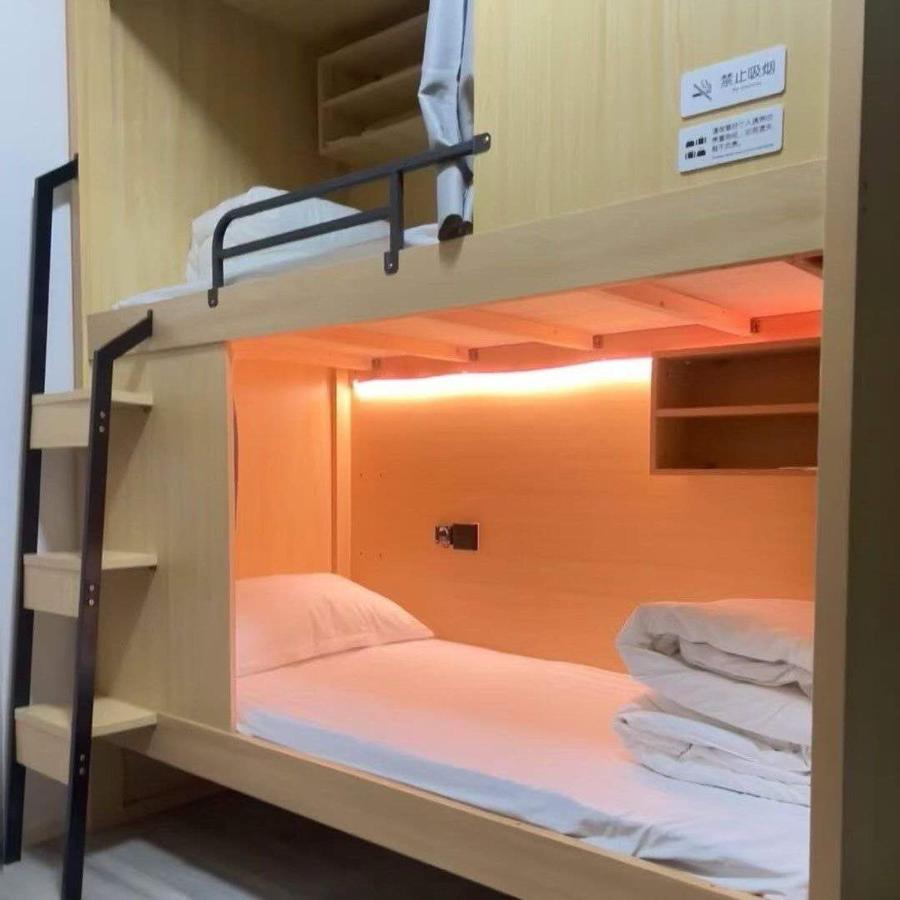 Single Bed in Dormitory Room