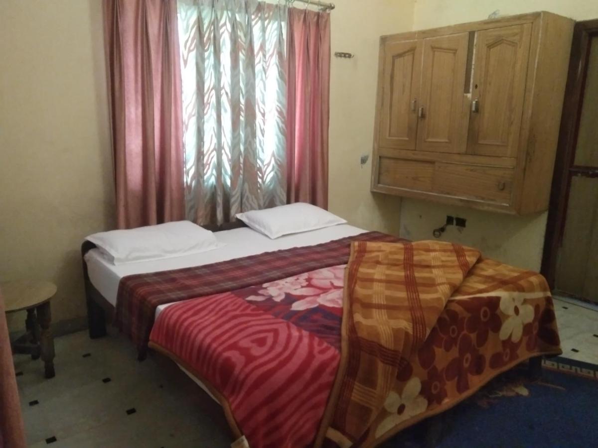 Chambre Deluxe (2 Adultes + 1 Enfant)