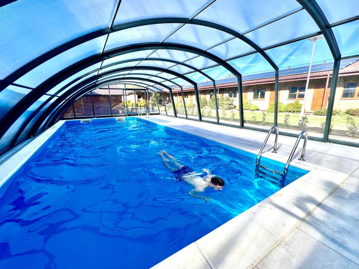 Chambre Triple - Vue sur la Piscine