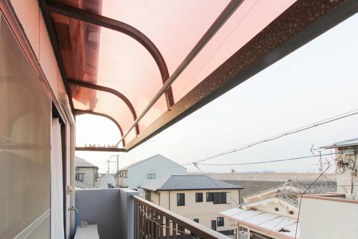 Minima Stay 静かな貸切戸建て 最大10名 軽自動車用駐車場 - Ferienwohnung Ōsaka