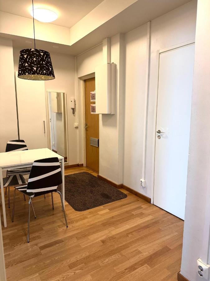 Kotimaailma Apartments Kamppi - 2BR in the city center with code lock - Ferienwohnung