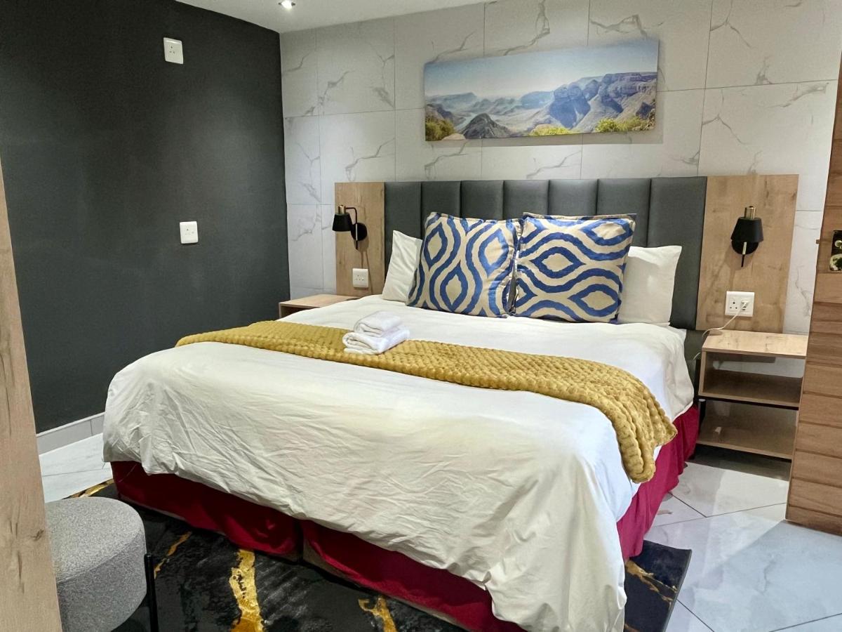 Camera Matrimoniale Deluxe (2 Adulti + 1 Bambino) 