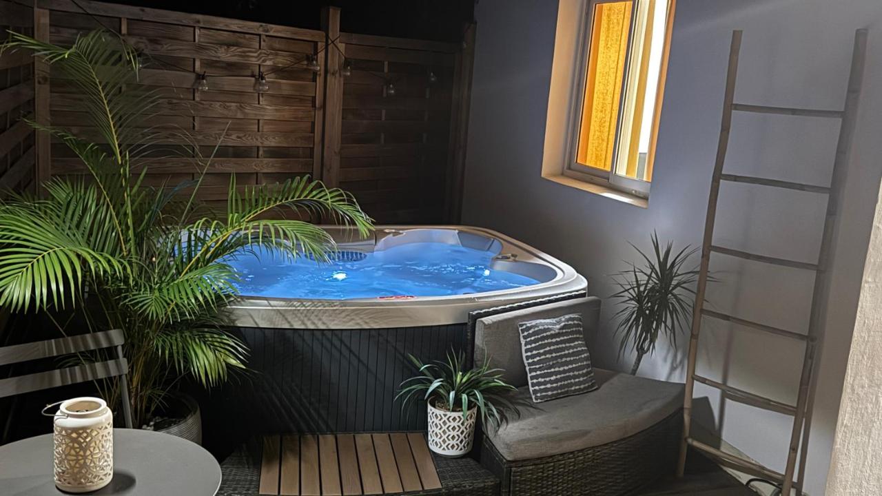Le Pluméria - T1 avec un SPA privatif - Ferienwohnung