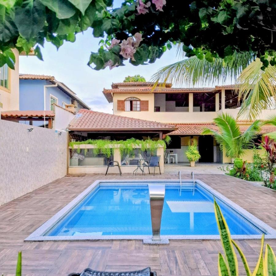 Casa Linear Térrea com Piscina no Atlântico - Chambres d’hôtes