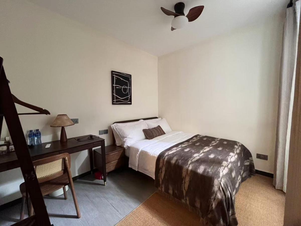 Queen Room with Shared Bathroom