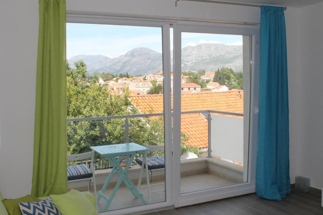 One-Bedroom Apartment with Balcony and Sea/Town View