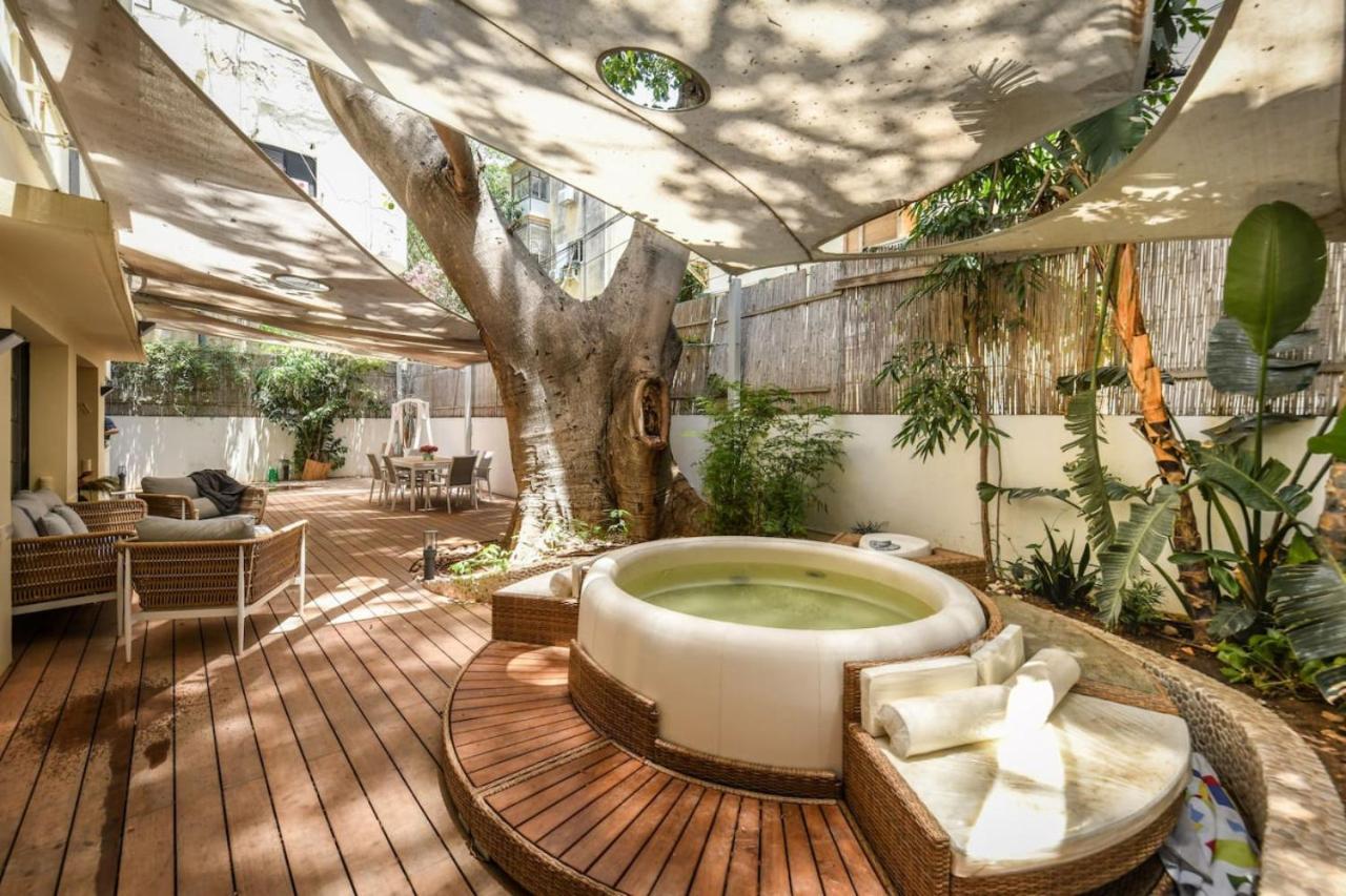 Charming 2BR Apt with a Breathtaking Patio in the Heart of the City with Shelter by Sea N' Rent - B&B
