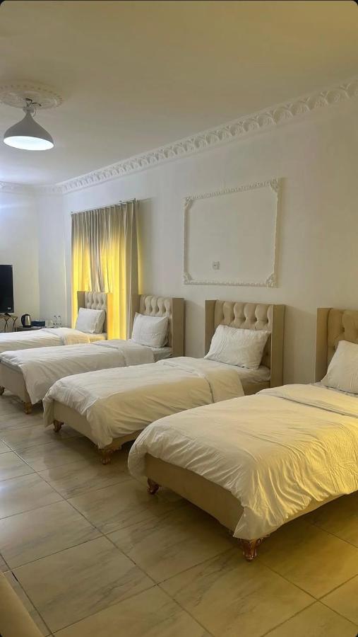 Camera Quadrupla con Vista Giardino 