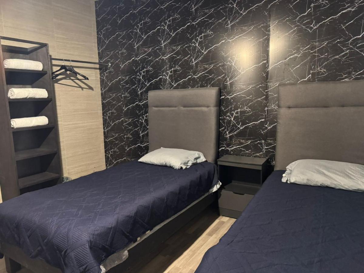 Basic Dreibettzimmer mit Gemeinschaftsbad