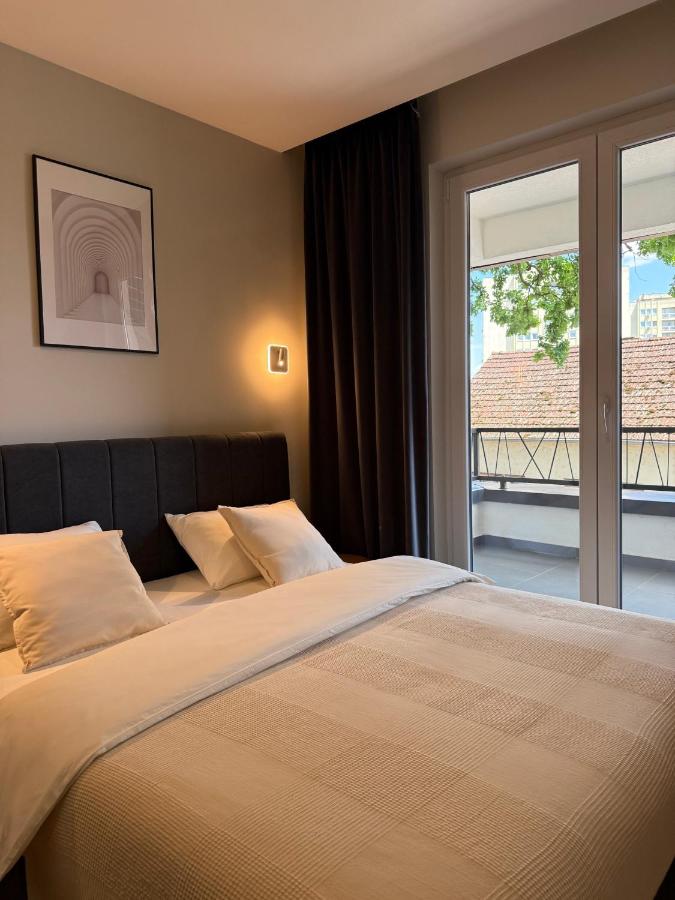 Tweepersoonskamer met 1 of 2 Bedden en een Extra Bed
