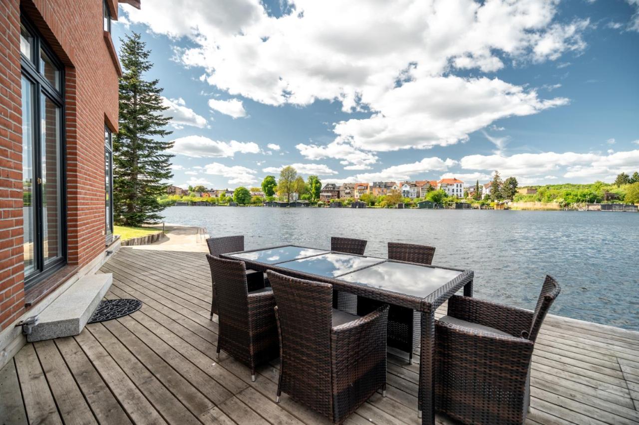 Seaside House - Ferienhaus mit privatem Bootsanleger, Terrasse und Wellness-Komfort direkt am Wasser - Ferienwohnung Malchow