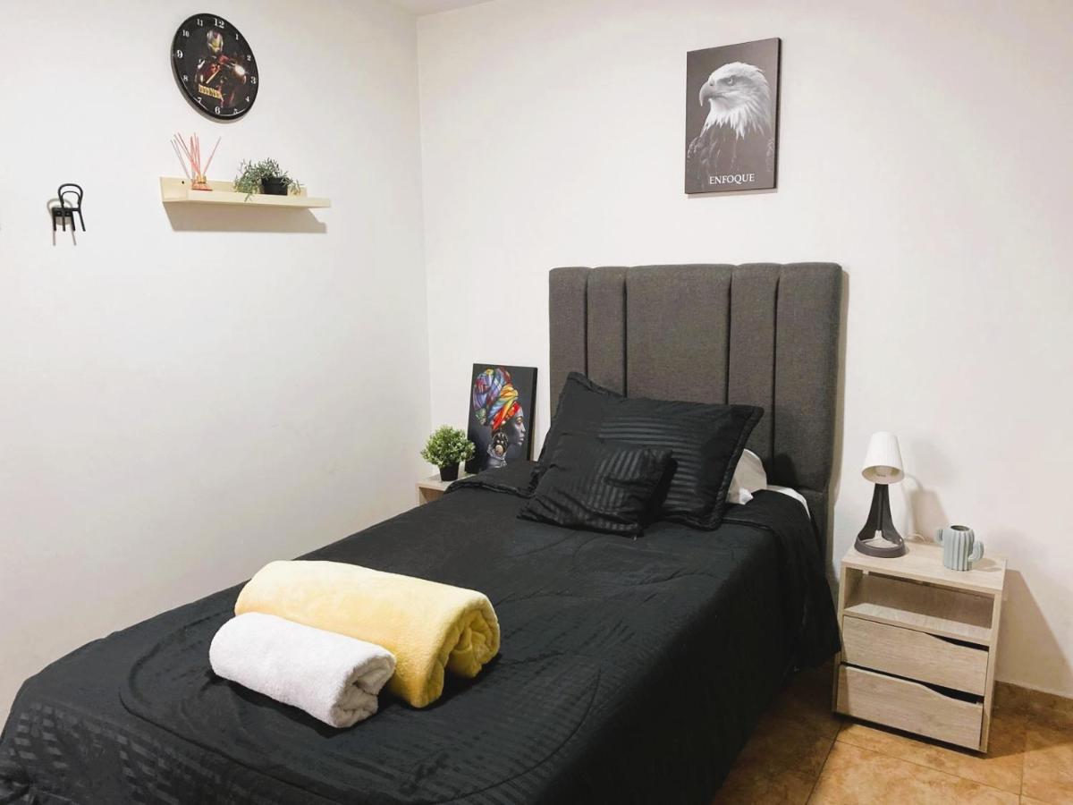 Habitación Individual con baño compartido