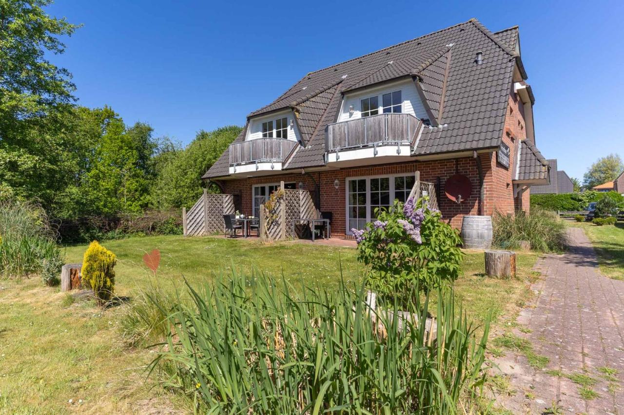 Ferienhaus Süderpiep – 4 individuelle Ferienwohnungen nahe Südstrand Ferienwohnung Robbe – stilvolle EG-Wohnung mit Terrasse in Strandnähe - B&B Sankt Peter-Ording