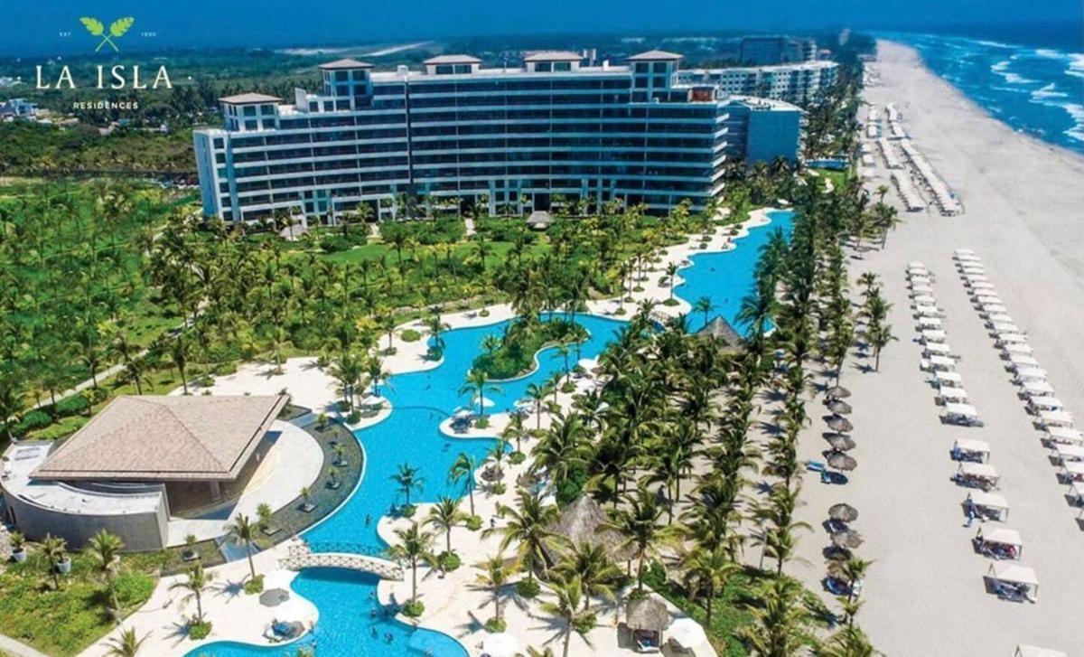 Depto en la playa con toboganes, juegos y restaurantes - B&B