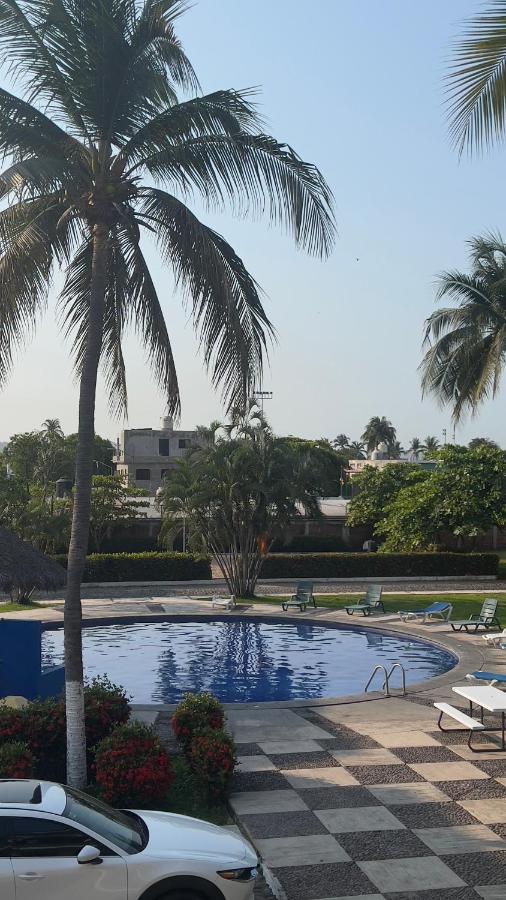 Departamento en suites palmas, con club de playa - Chambres d’hôtes Manzanillo