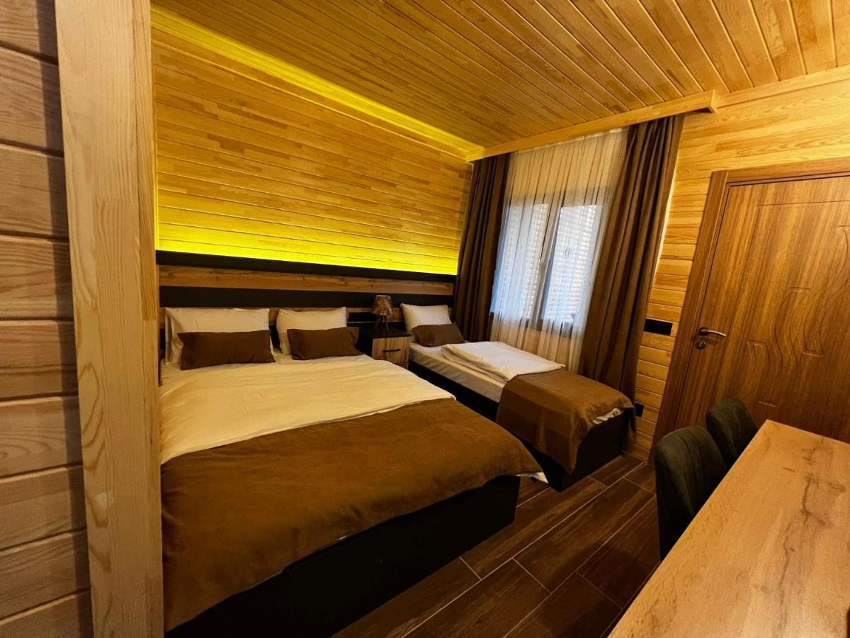 Deluxe Dreibettzimmer