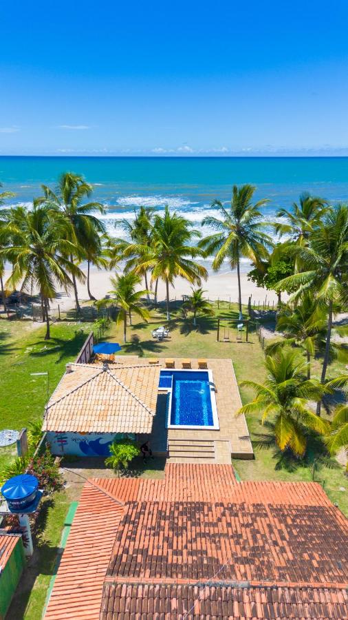 Casa completo com grande piscina sob coqueiros, pe na areia - B&B
