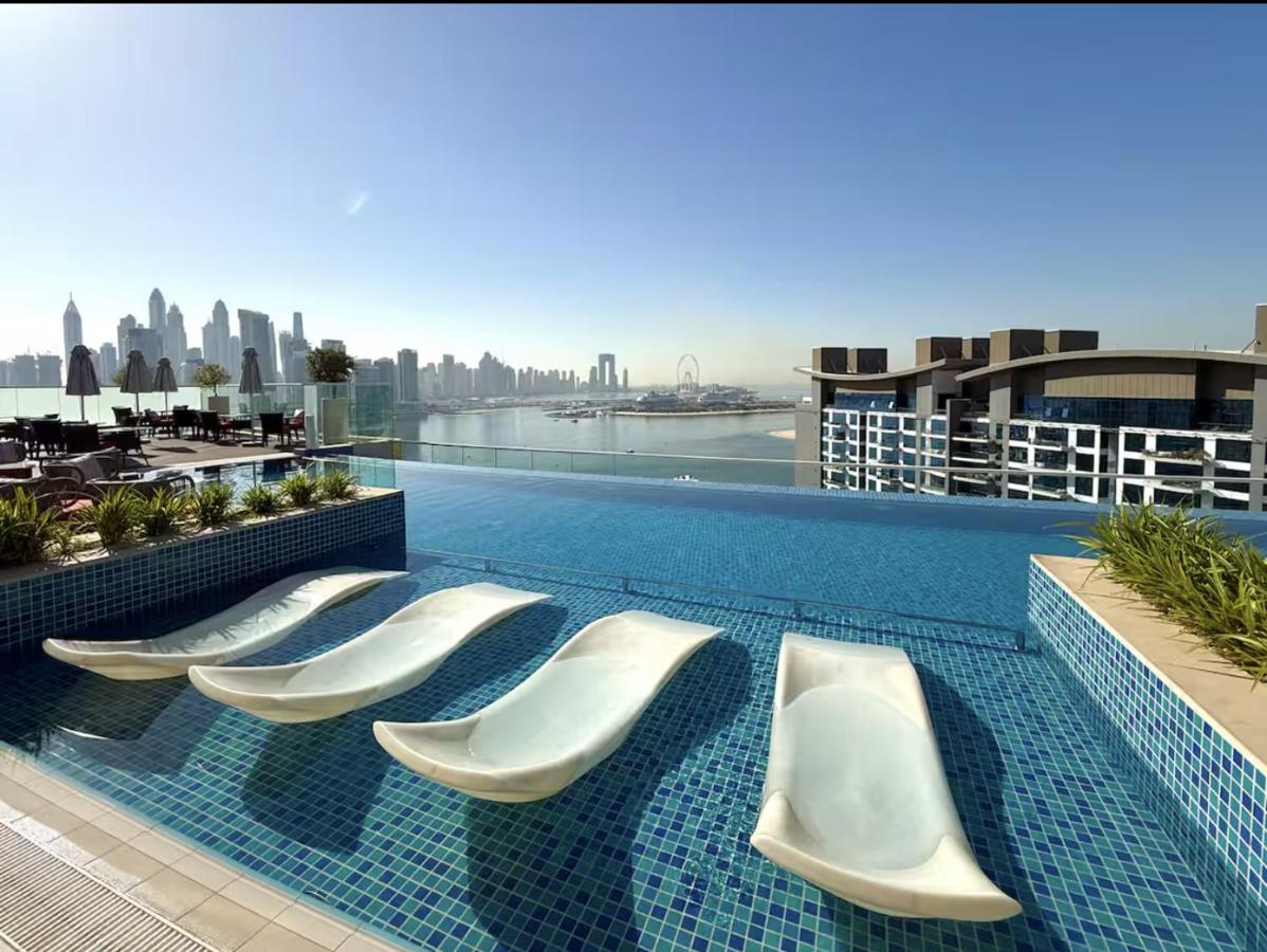 Palm Jumeirah Beachfront apartment with rooftop Infinity pool and Atlantis view - Ferienwohnung Dubai