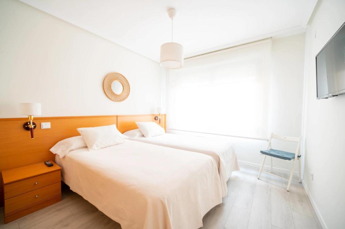 Camera Doppia con Letti Singoli con Letto Supplementare