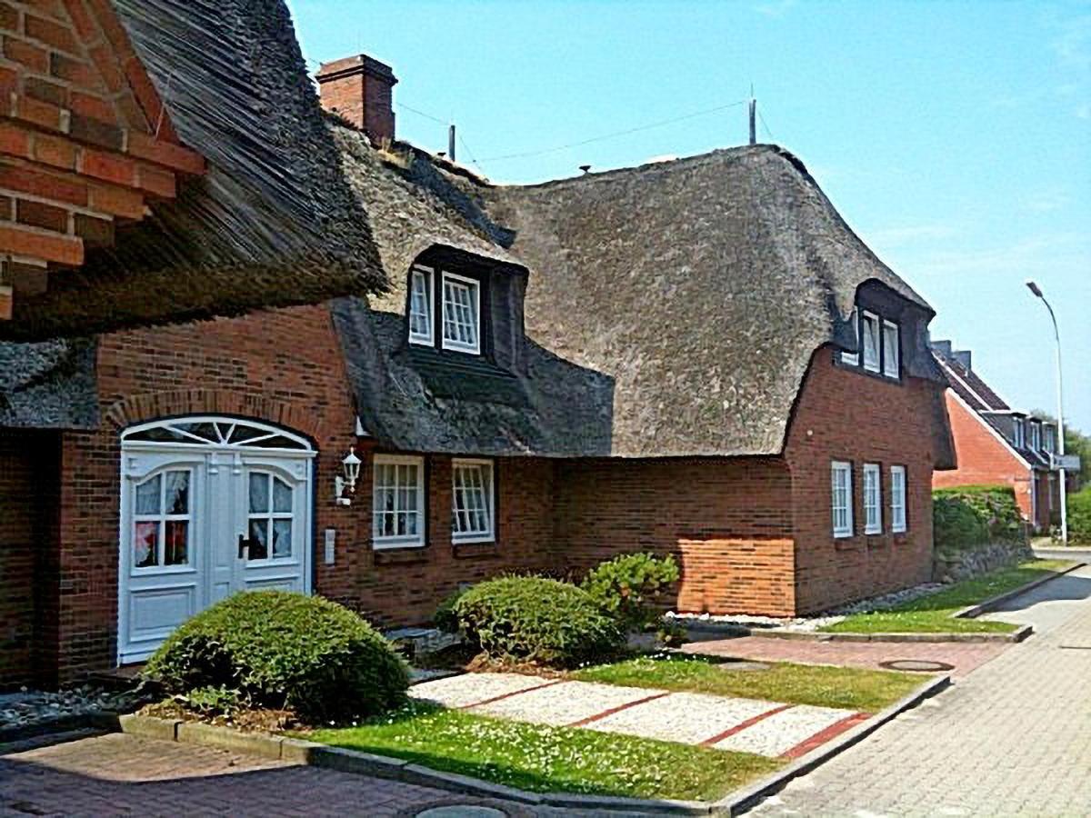 Geschmackvoll ausgestattete 2-Zimmer-Wohnung im EG eines typischen Reetdachhauses - B&B Westerland