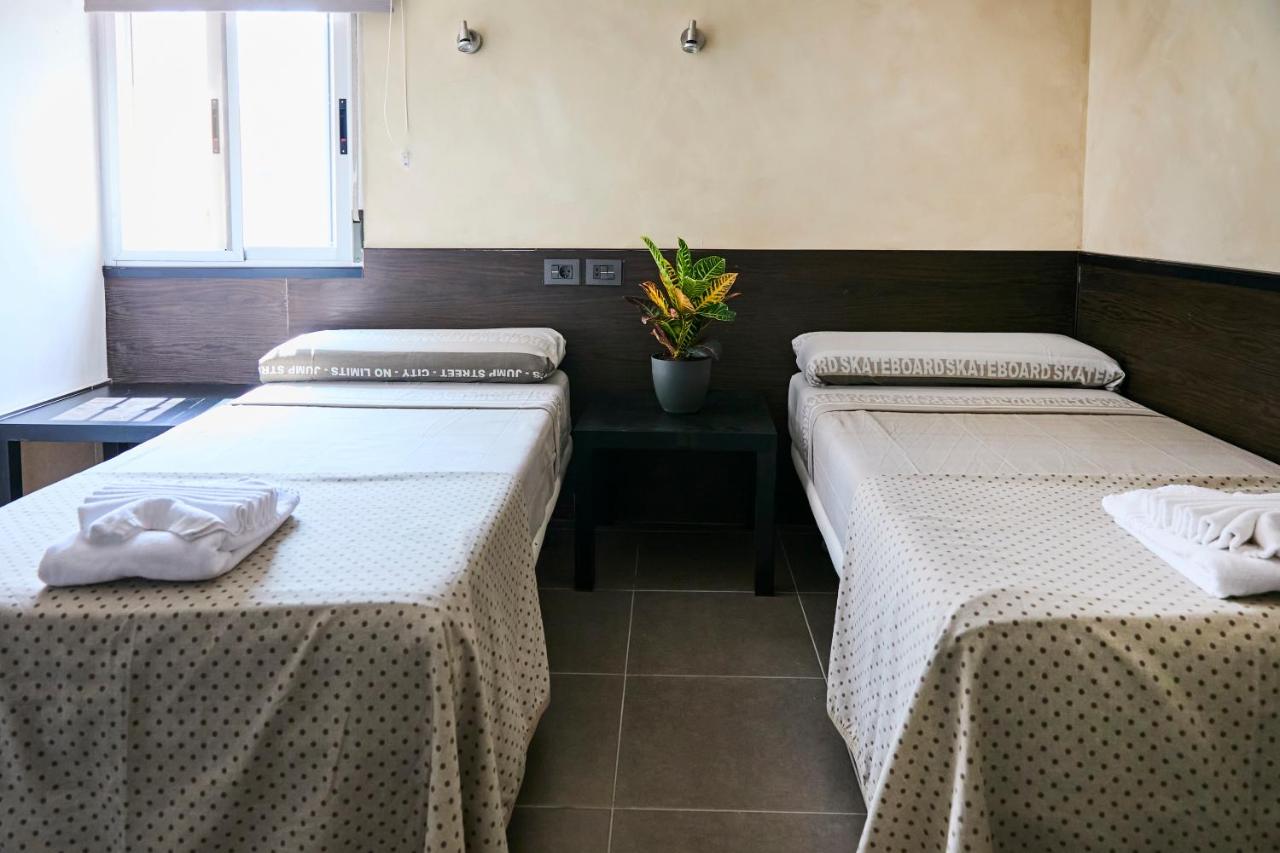 Habitación Triple con baño compartido