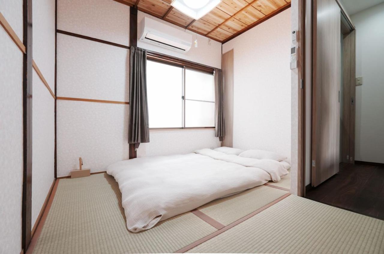 西九条駅徒歩3分USJと梅田と関空直通丸々貸切一軒家koto別館 - B&B Osaka