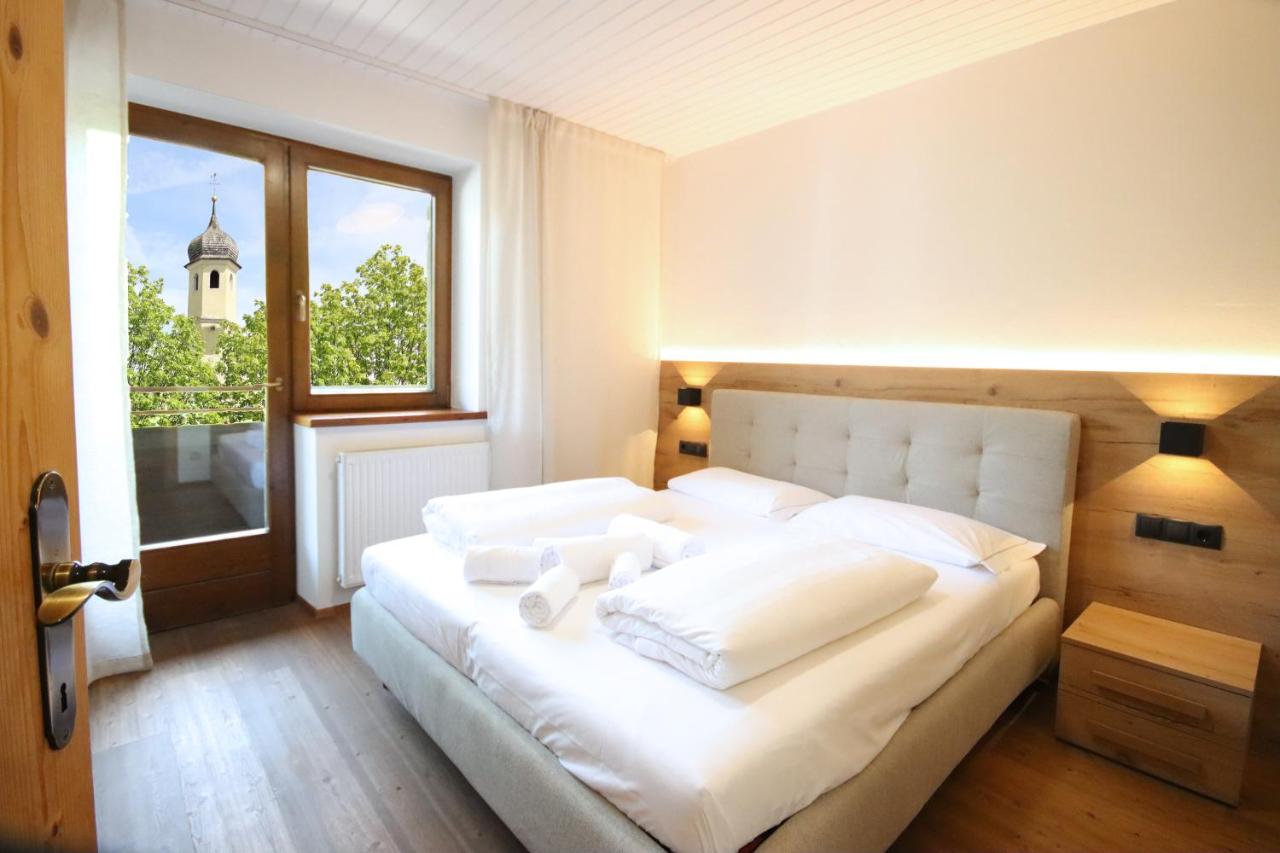 AT 112-9 - Appartamento Bilocale con Balcone e Vista Fiume