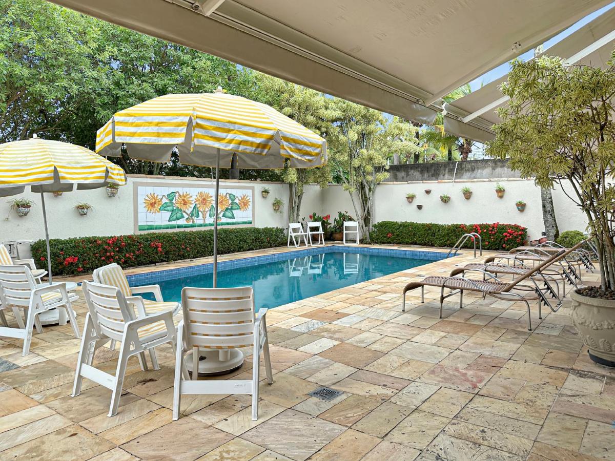 Piscina Churrasqueira Suíte 200m do Mar AC - B&B Guarujá