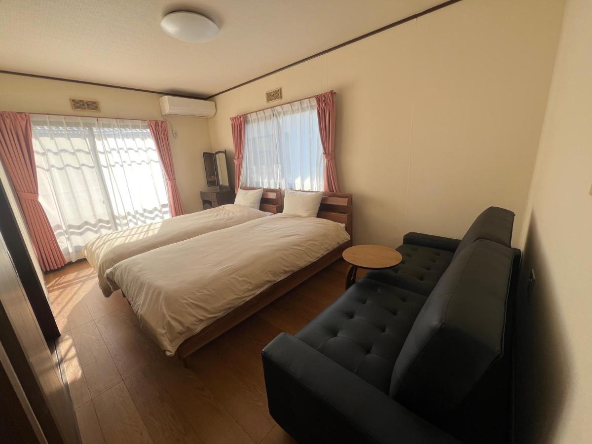 Camera Tripla con Bagno in Comune