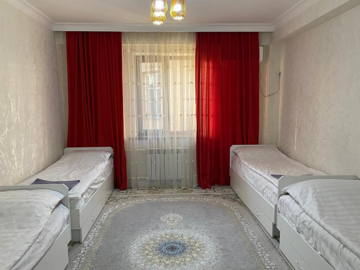 Cama individual en habitación compartida