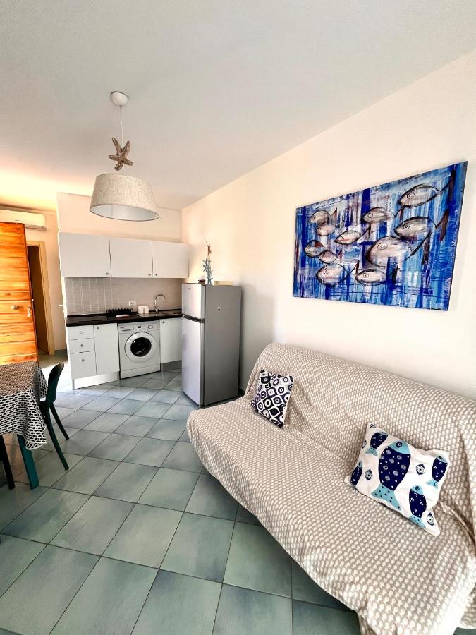 APPARTAMENTO a 30 metri dalla spiaggia - Ferienwohnung Porto Azzurro