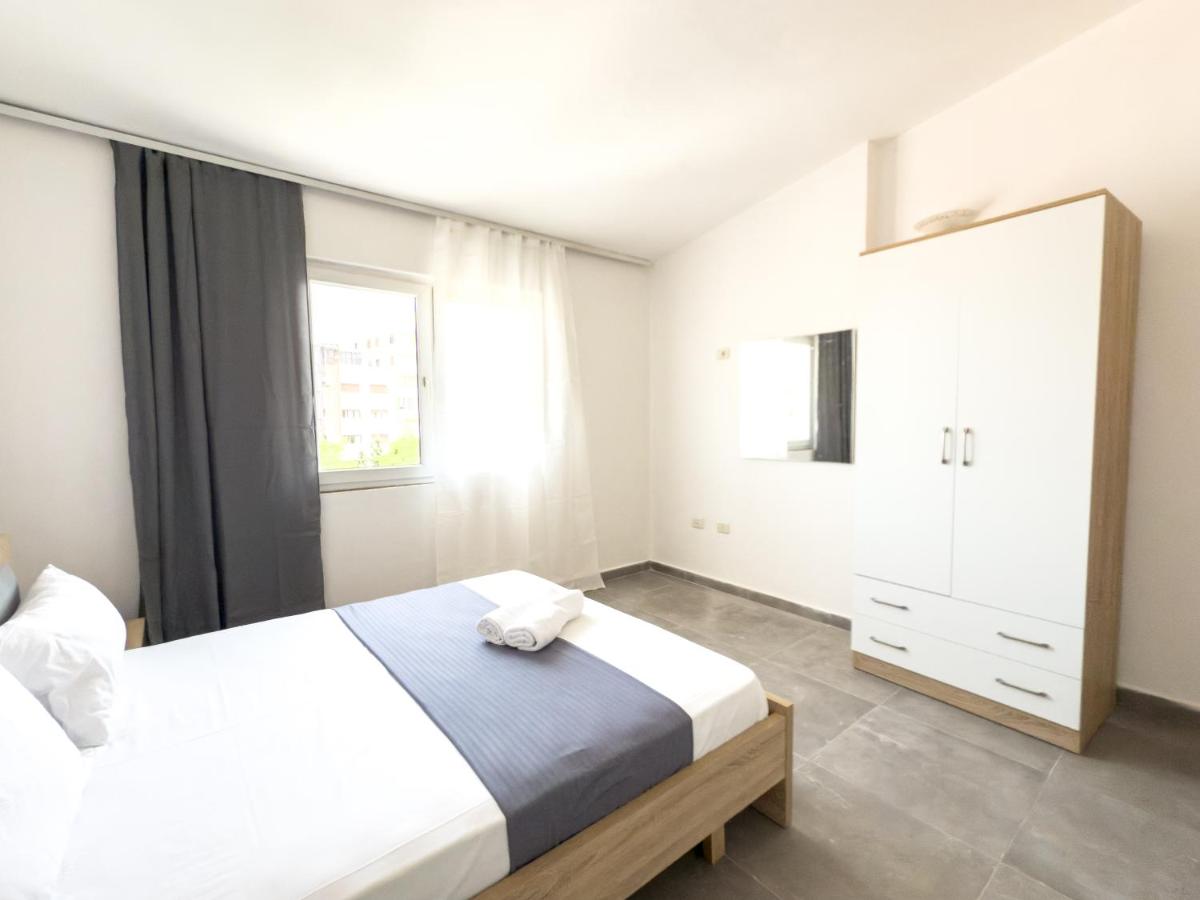 One-Bedroom Apartment with Balcony and City View