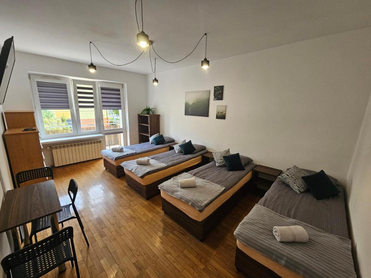 Chambre Quadruple avec Salle de Bains Commune