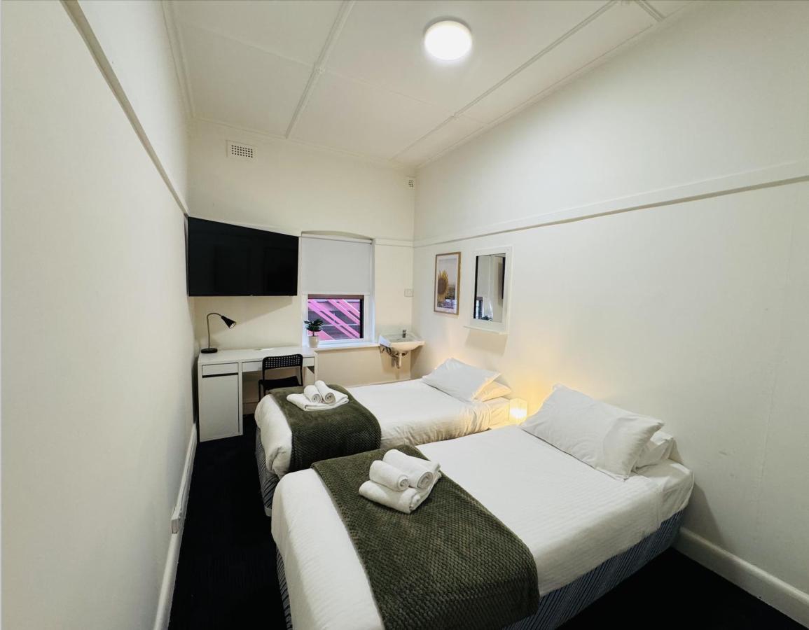 Tweepersoonskamer met 2 Aparte Bedden