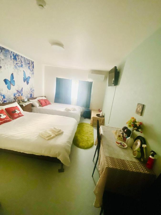 Tweepersoonskamer met 1 of 2 Bedden en Gedeelde Badkamer