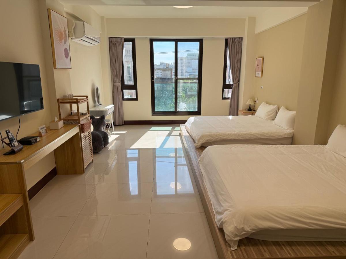 Camera Doppia con Letti Singoli e Bagno in Comune