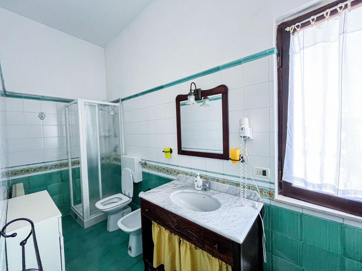 Quadruple Room with Private Bathroom